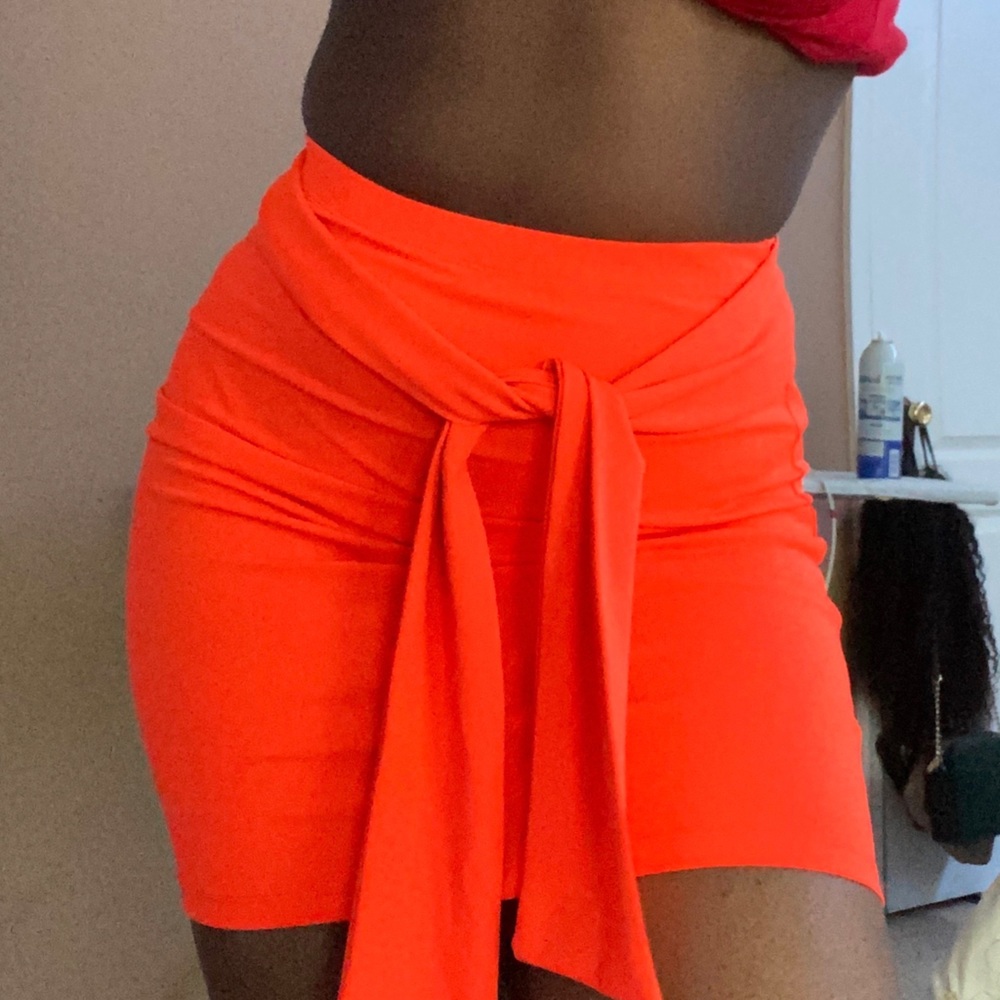 Orange body con skirt w/ front tie